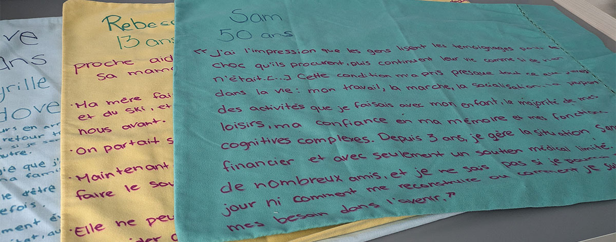 A photo of pillowcases. The pillowcases have writing on them that conveys stories of people's struggles with long Covid.